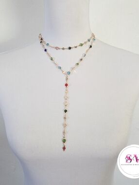 Gold necklace with colorful gemstones